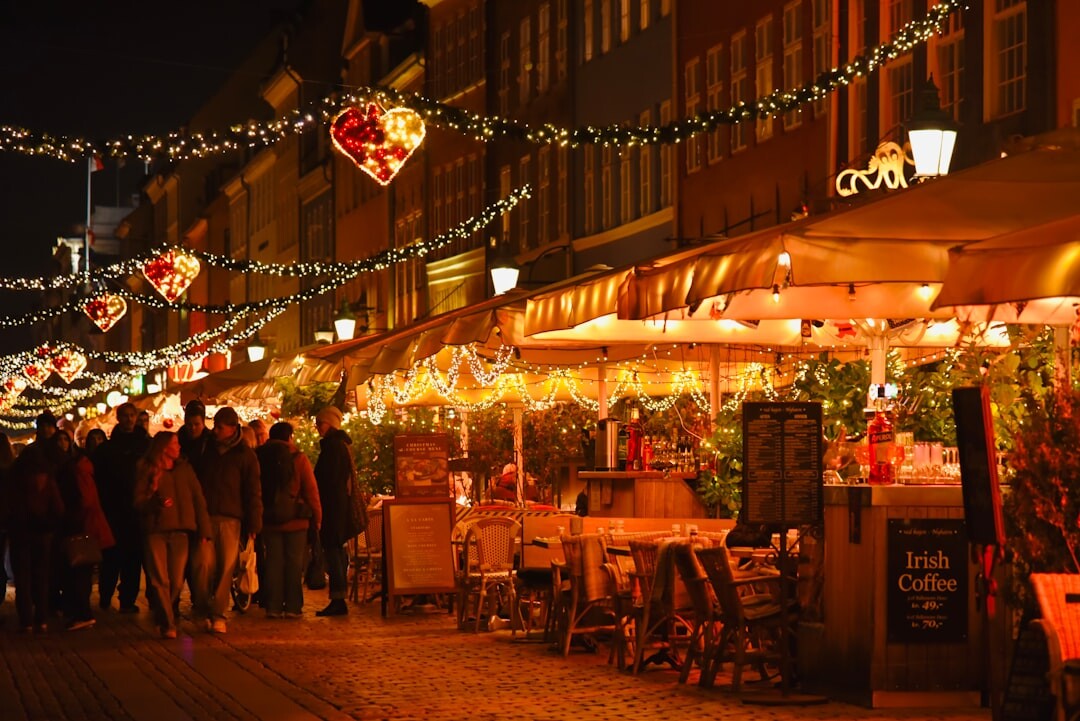 Local outdoor market with people shopping in Denmark