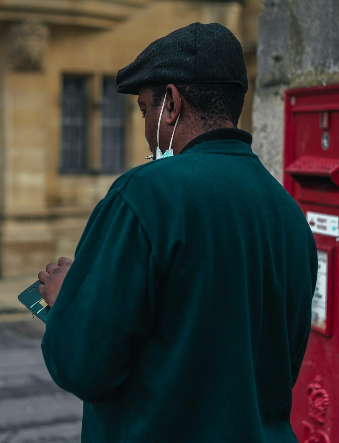 postman delivering mail
