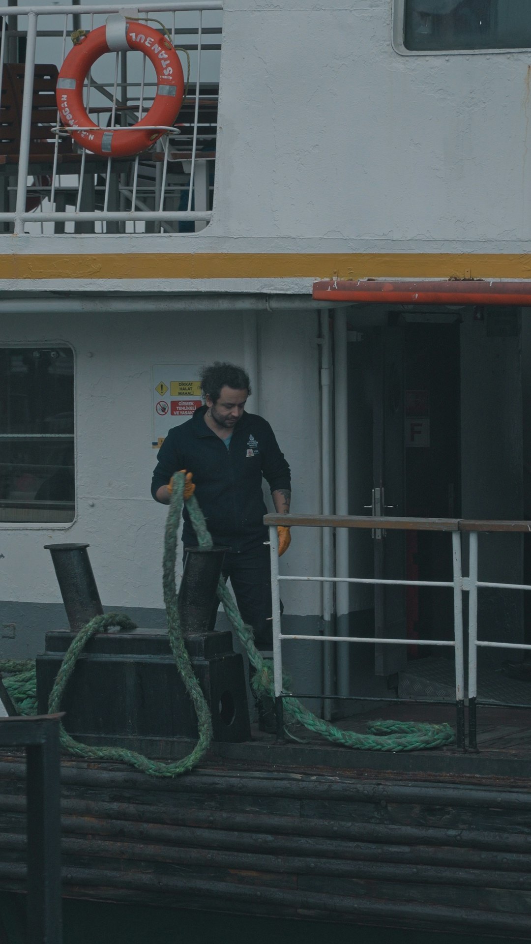 fisherman sorting catch on deck