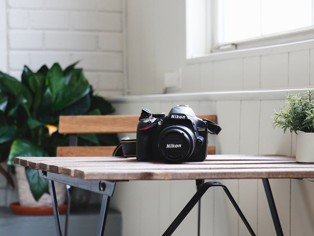 Professional camera and photography equipment on a table